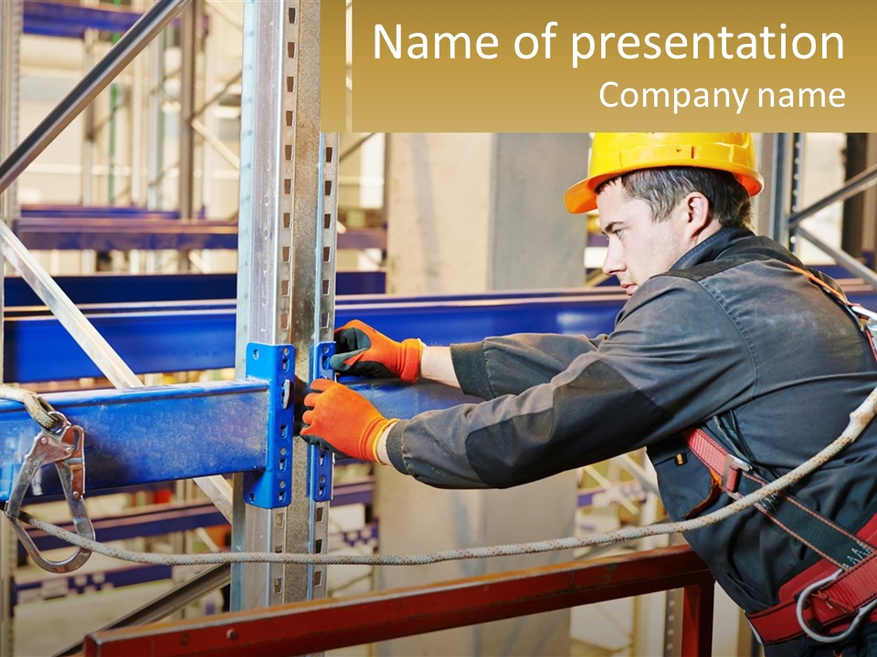 A Man In A Hard Hat And Safety Gear Working On A Machine PowerPoint Template