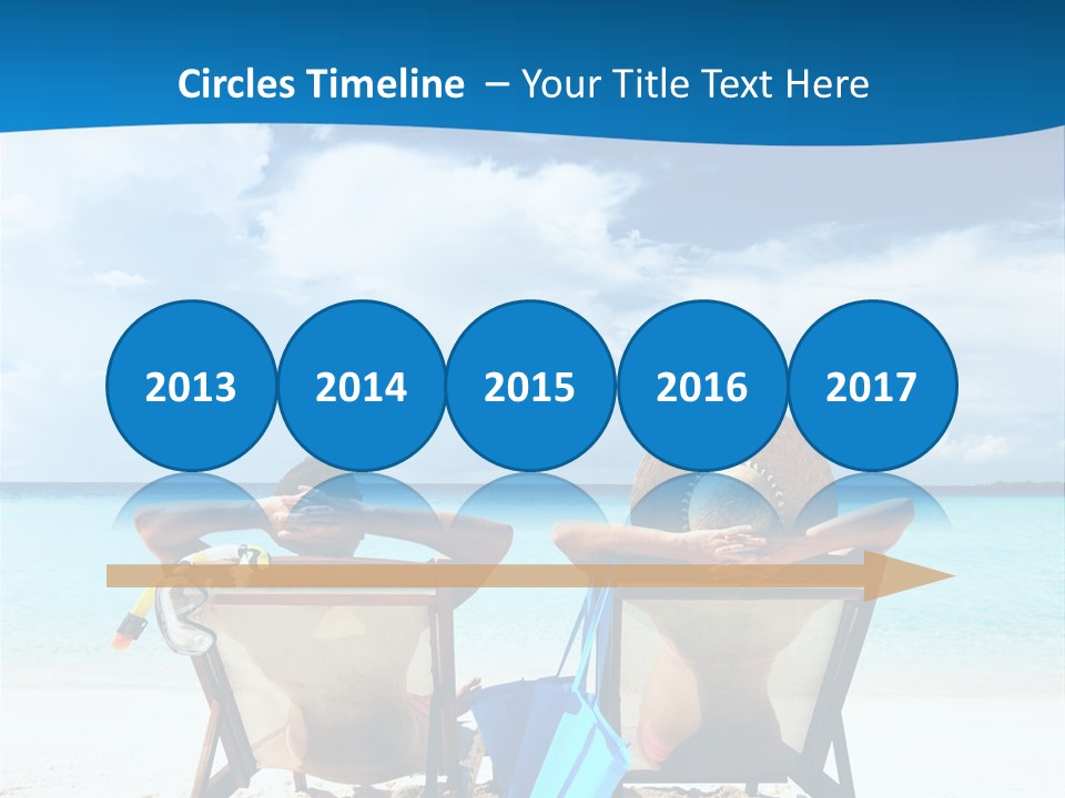 Two People Sitting In Beach Chairs On The Beach PowerPoint Template