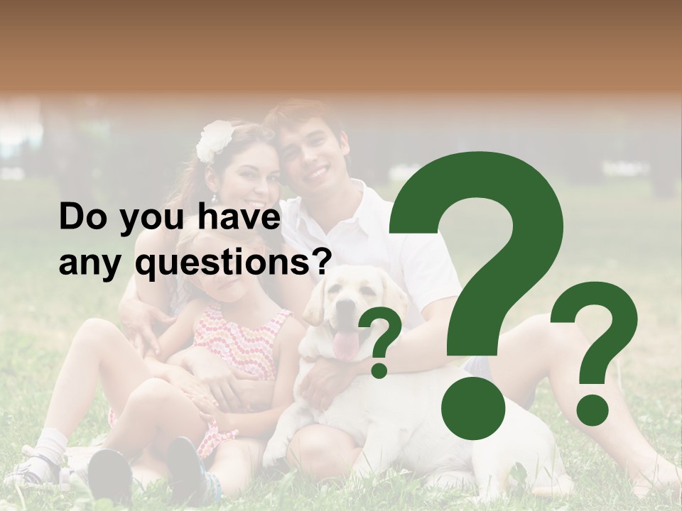 A Family Sitting In The Grass With A Dog PowerPoint Template
