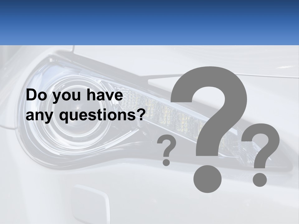 A Close Up Of A Car Headlight On A White Car PowerPoint Template