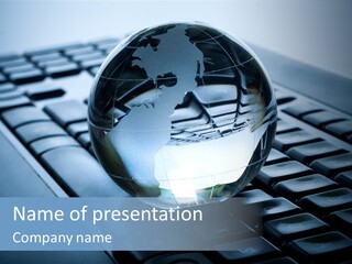 A Globe On Top Of A Computer Keyboard PowerPoint Template