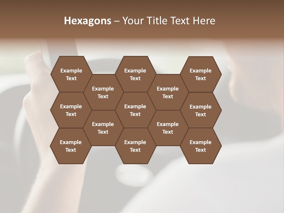 A Man Holding A Cell Phone While Driving A Car PowerPoint Template