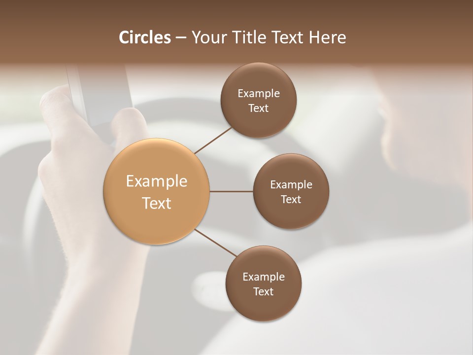 A Man Holding A Cell Phone While Driving A Car PowerPoint Template