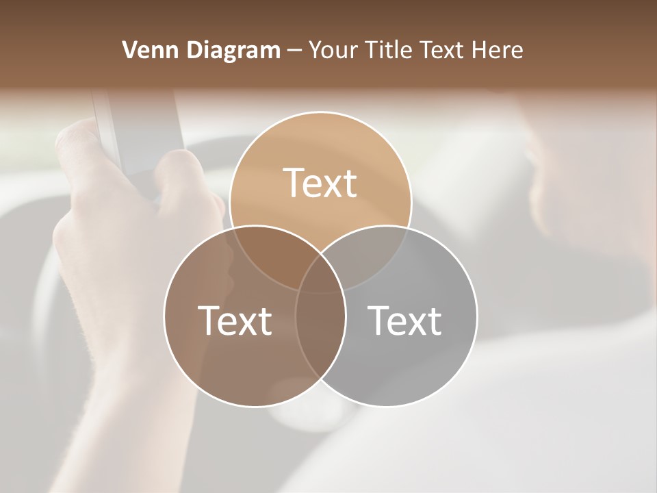 A Man Holding A Cell Phone While Driving A Car PowerPoint Template