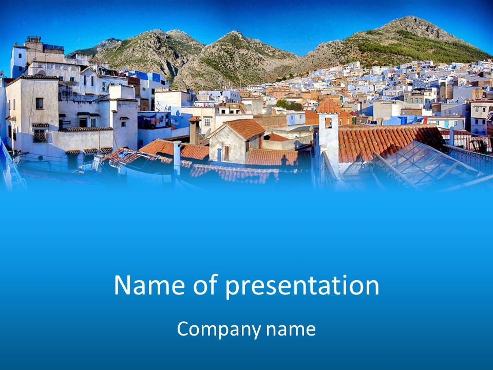 A View Of A City With Mountains In The Background PowerPoint Template
