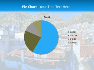 A View Of A City With Mountains In The Background PowerPoint Template