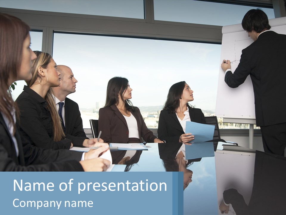 A Group Of Business People Sitting Around A Table PowerPoint Template