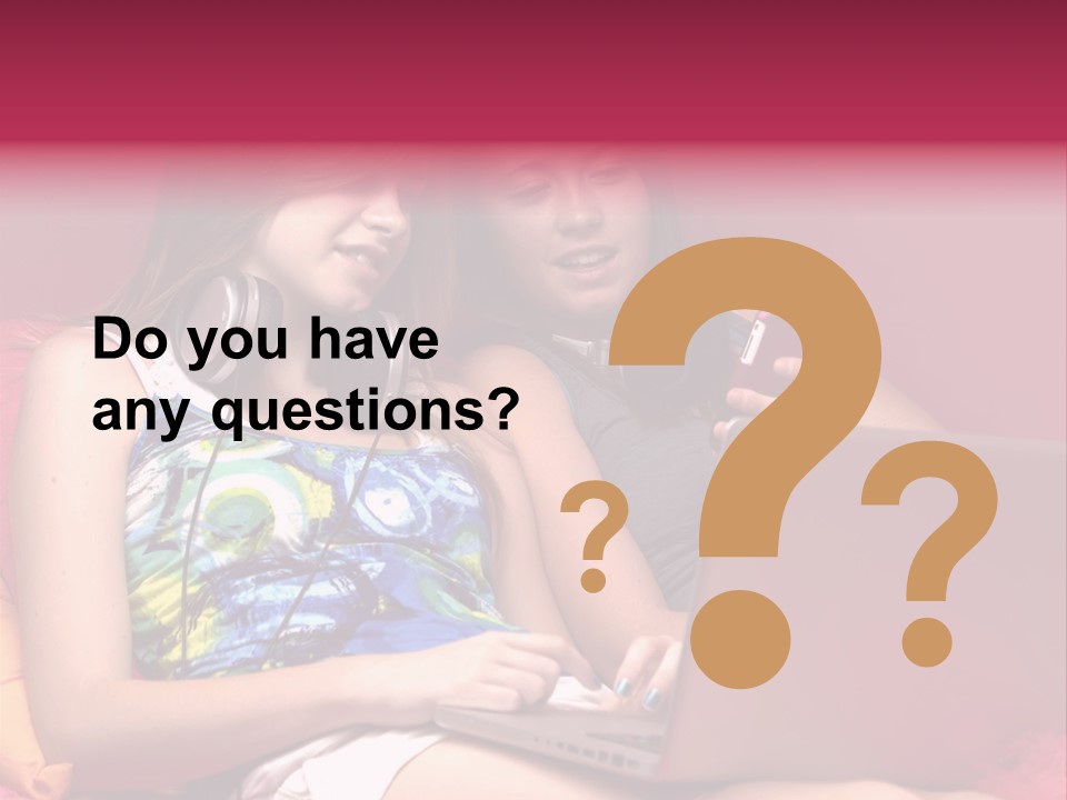 Two Girls Sitting On A Bed With Headphones On PowerPoint Template