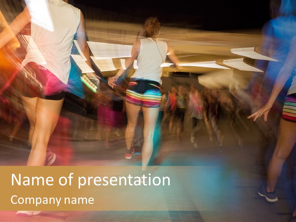 A Group Of People Walking Down A Street At Night PowerPoint Template