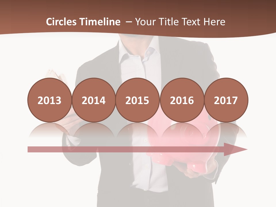 A Man In A Suit Holding A Piggy Bank PowerPoint Template