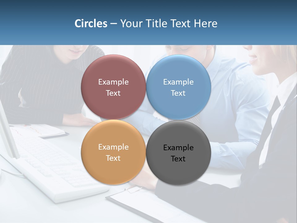 A Group Of People Sitting Around A Table With A Laptop PowerPoint Template