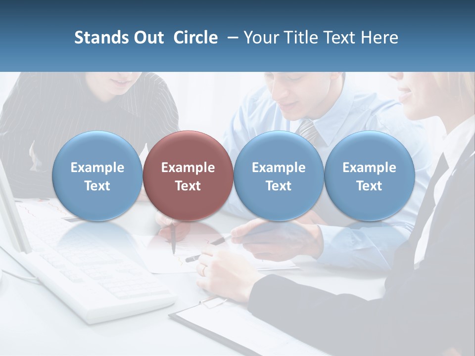 A Group Of People Sitting Around A Table With A Laptop PowerPoint Template