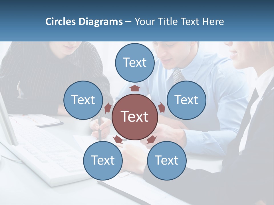 A Group Of People Sitting Around A Table With A Laptop PowerPoint Template