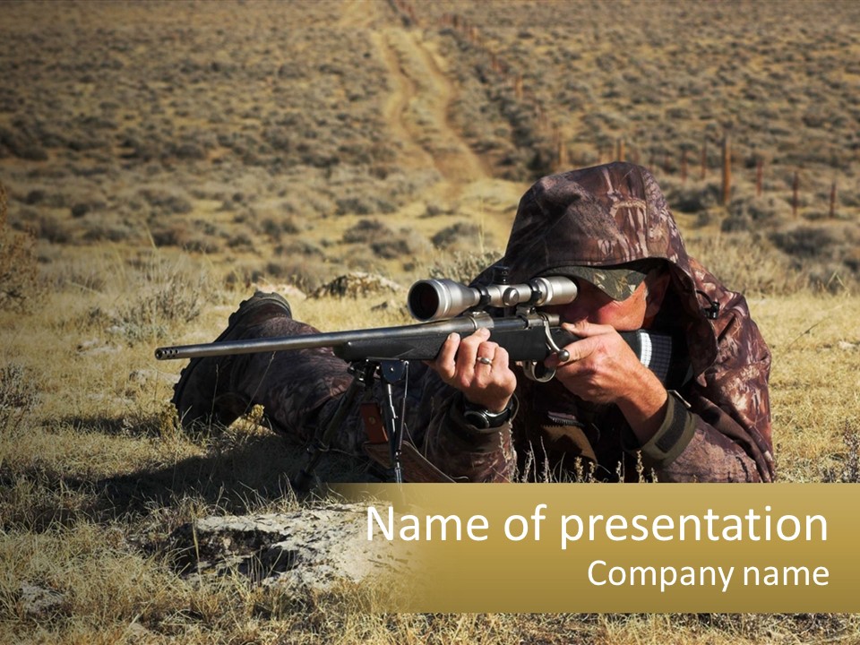 A Man With A Rifle In A Field PowerPoint Template