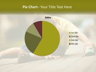 A Young Boy Playing With A Toy Truck PowerPoint Template