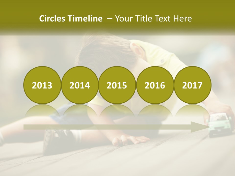 A Young Boy Playing With A Toy Truck PowerPoint Template