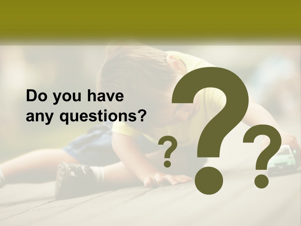 A Young Boy Playing With A Toy Truck PowerPoint Template