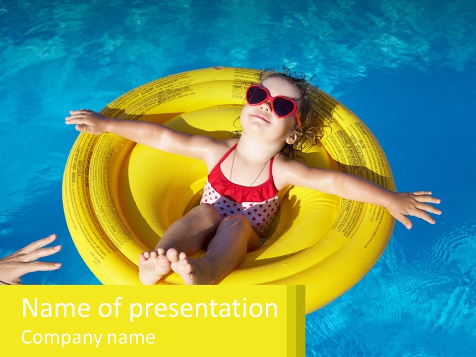 A Little Girl In A Red Swimsuit Floating On A Raft In A Pool PowerPoint Template