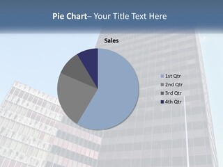 A Tall Building With A Blue Sky In The Background PowerPoint Template
