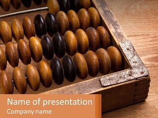 A Wooden Abacusk Sitting On Top Of A Wooden Table PowerPoint Template