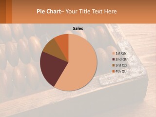 A Wooden Abacusk Sitting On Top Of A Wooden Table PowerPoint Template