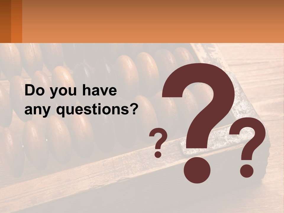 A Wooden Abacusk Sitting On Top Of A Wooden Table PowerPoint Template