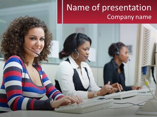A Woman Sitting In Front Of A Computer With A Headset On PowerPoint Template
