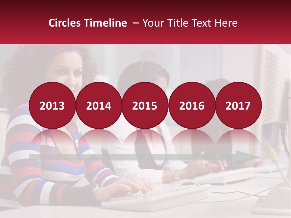 A Woman Sitting In Front Of A Computer With A Headset On PowerPoint Template