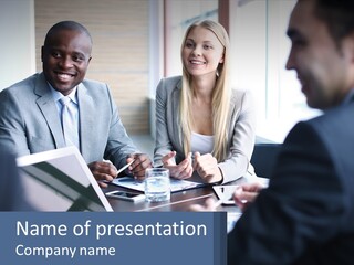 A Group Of People Sitting Around A Table PowerPoint Template