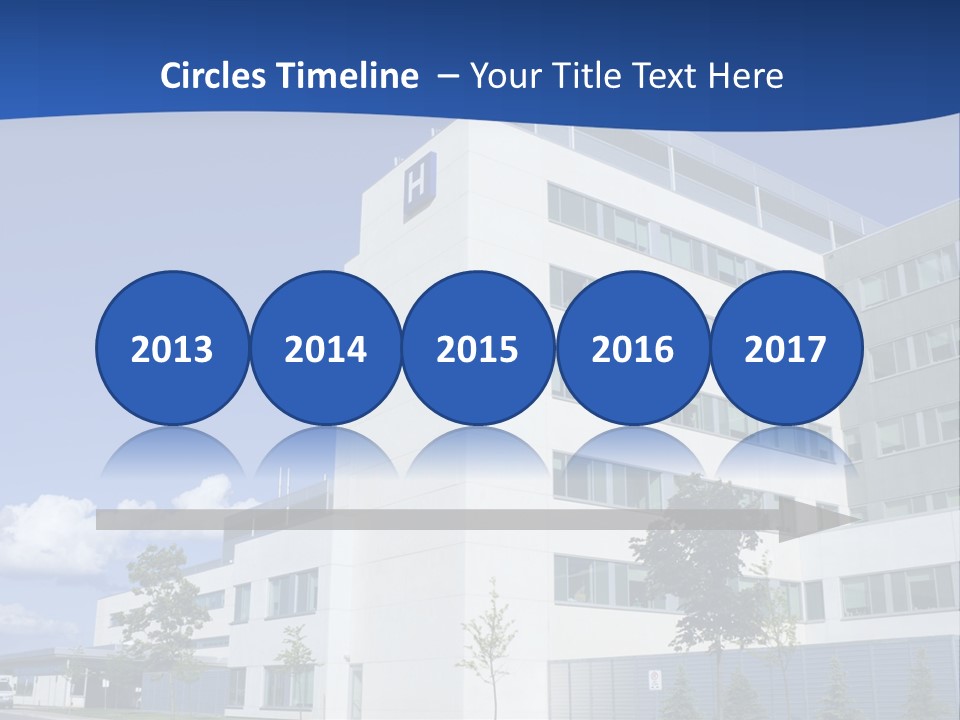 A White Building With A Blue Sky In The Background PowerPoint Template