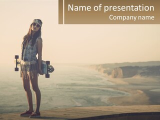 A Young Girl Holding A Skateboard Standing On A Pier PowerPoint Template
