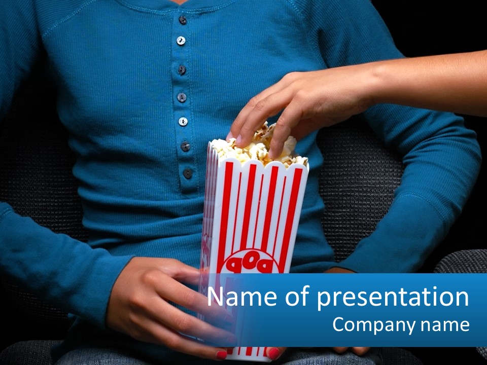 A Person Sitting In A Chair Holding A Bag Of Popcorn PowerPoint Template
