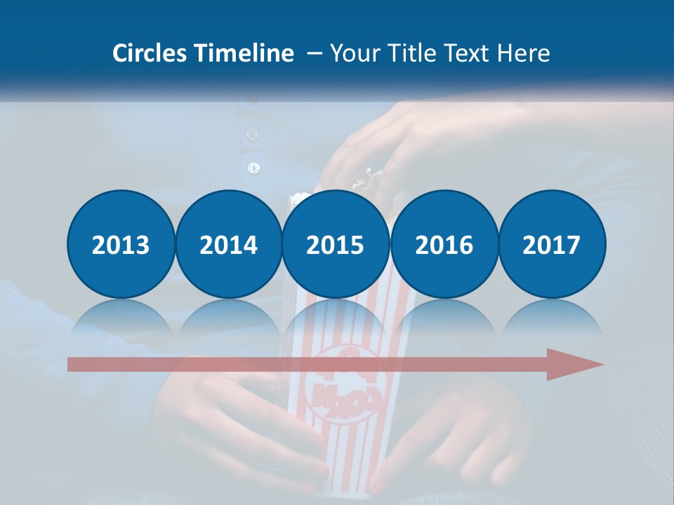 A Person Sitting In A Chair Holding A Bag Of Popcorn PowerPoint Template