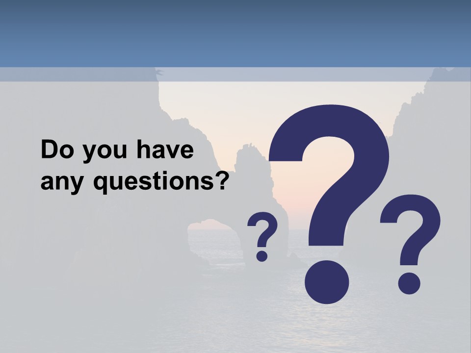 A Large Body Of Water With Rocks In The Background PowerPoint Template