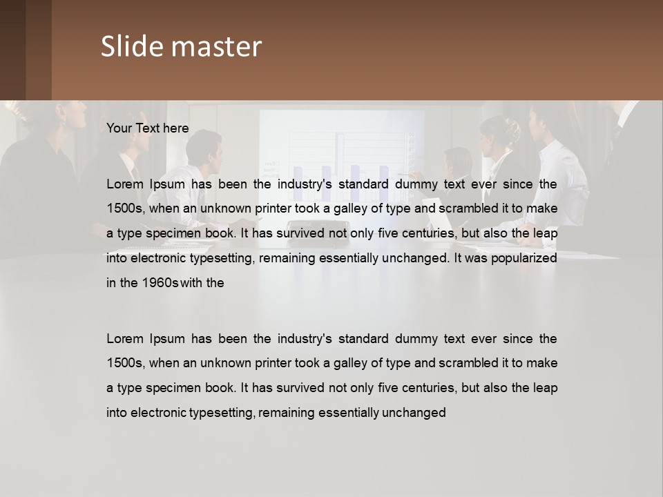 A Group Of People Sitting Around A Conference Table PowerPoint Template