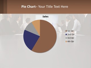 A Group Of People Sitting Around A Conference Table PowerPoint Template