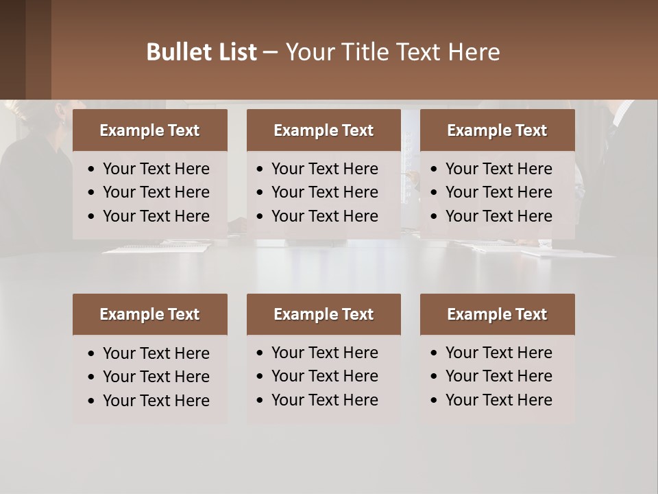 A Group Of People Sitting Around A Conference Table PowerPoint Template