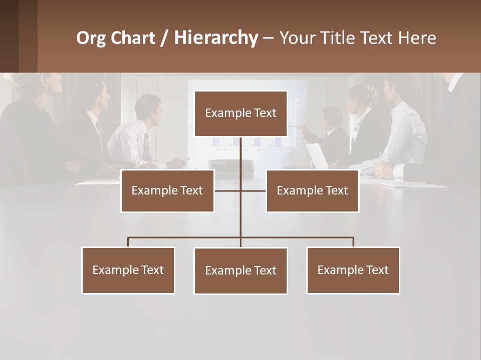 A Group Of People Sitting Around A Conference Table PowerPoint Template