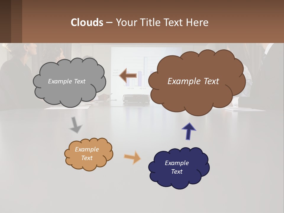 A Group Of People Sitting Around A Conference Table PowerPoint Template