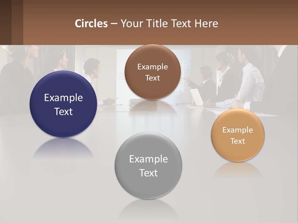 A Group Of People Sitting Around A Conference Table PowerPoint Template