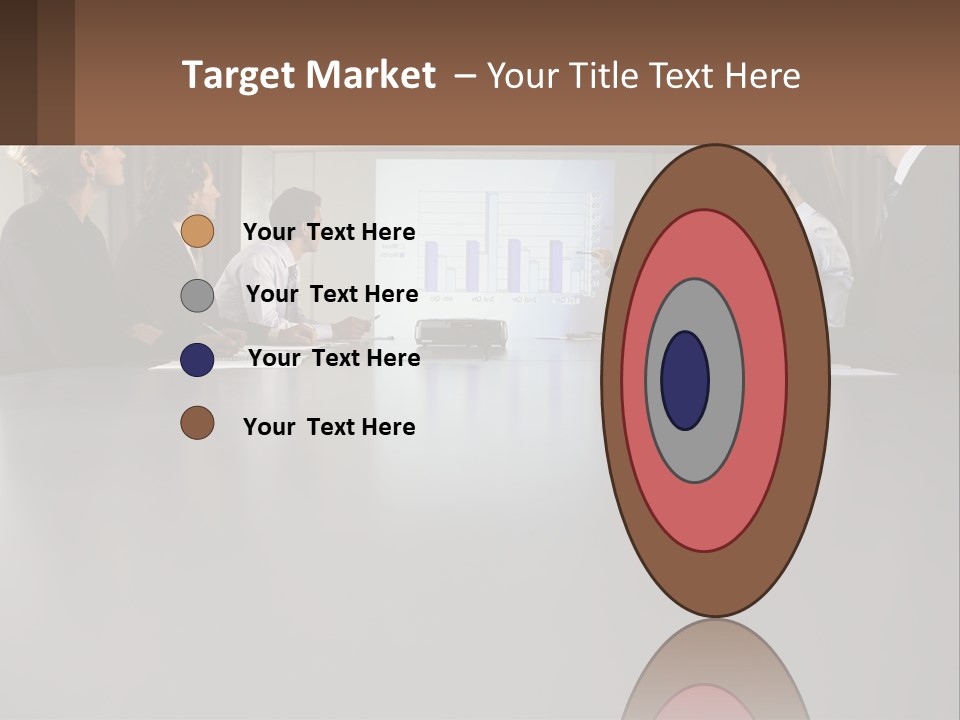 A Group Of People Sitting Around A Conference Table PowerPoint Template