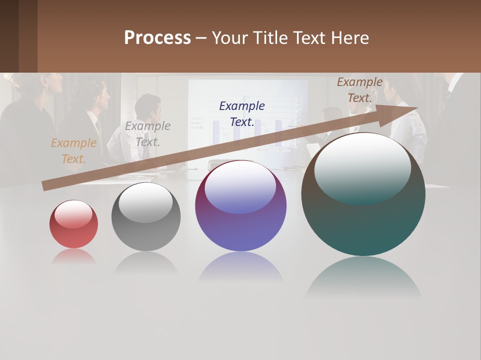 A Group Of People Sitting Around A Conference Table PowerPoint Template