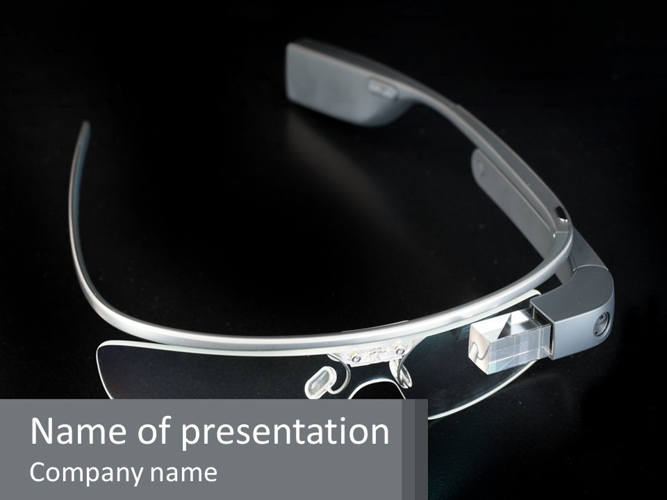 A Pair Of Glasses Sitting On Top Of A Table PowerPoint Template