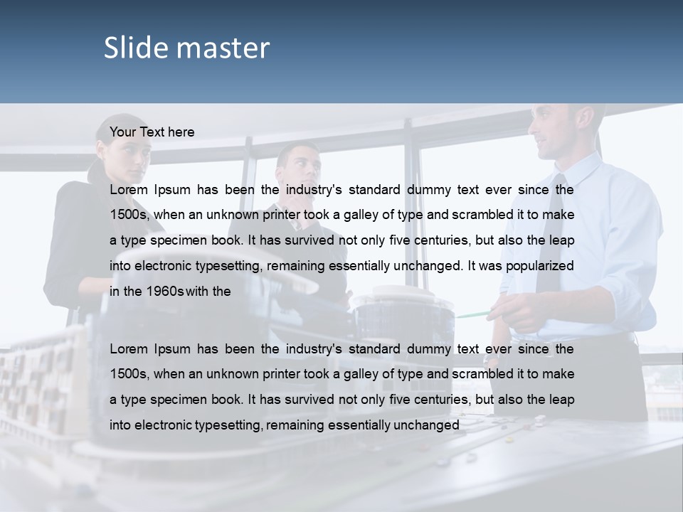 A Group Of People Standing Around A Model Of A Building PowerPoint Template