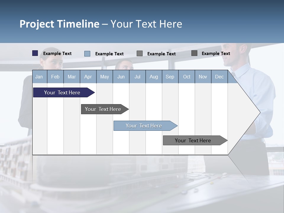 A Group Of People Standing Around A Model Of A Building PowerPoint Template