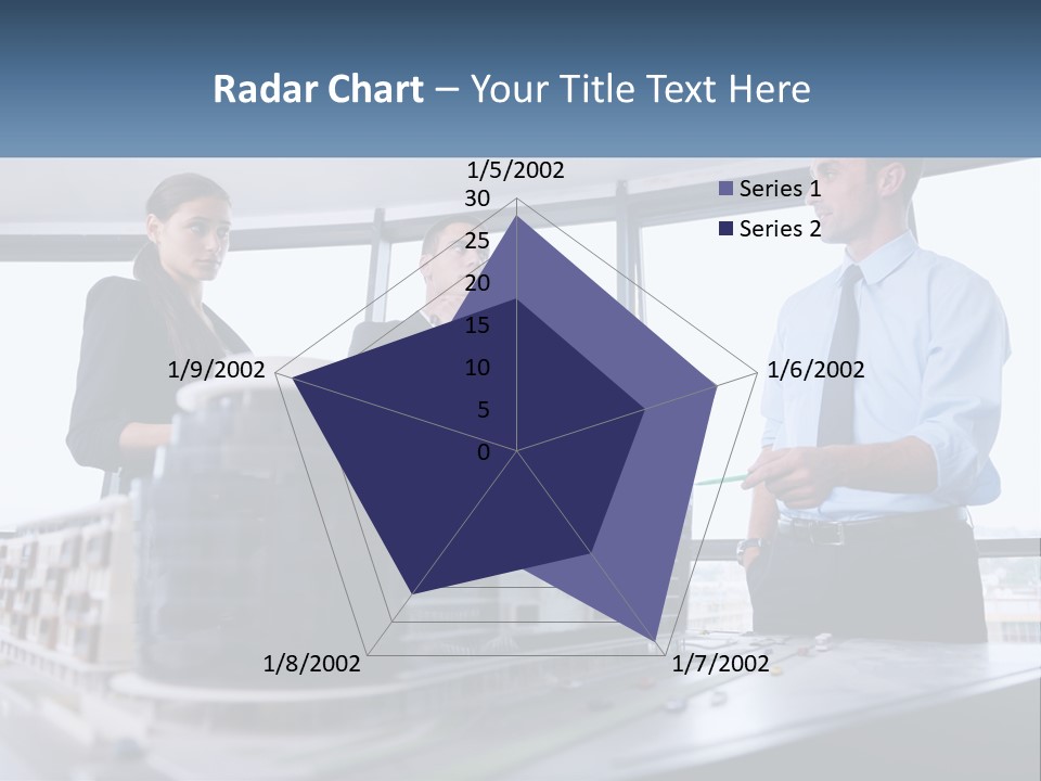 A Group Of People Standing Around A Model Of A Building PowerPoint Template