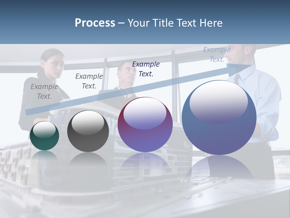 A Group Of People Standing Around A Model Of A Building PowerPoint Template
