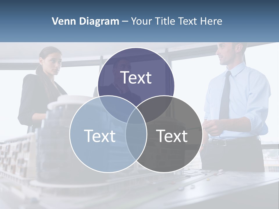 A Group Of People Standing Around A Model Of A Building PowerPoint Template
