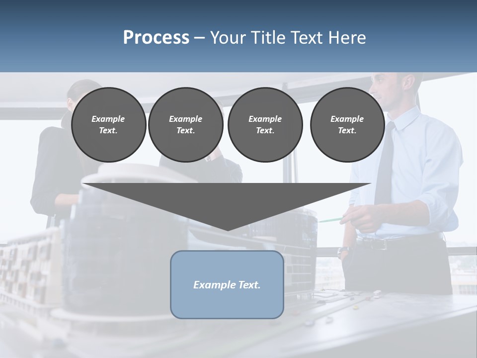 A Group Of People Standing Around A Model Of A Building PowerPoint Template