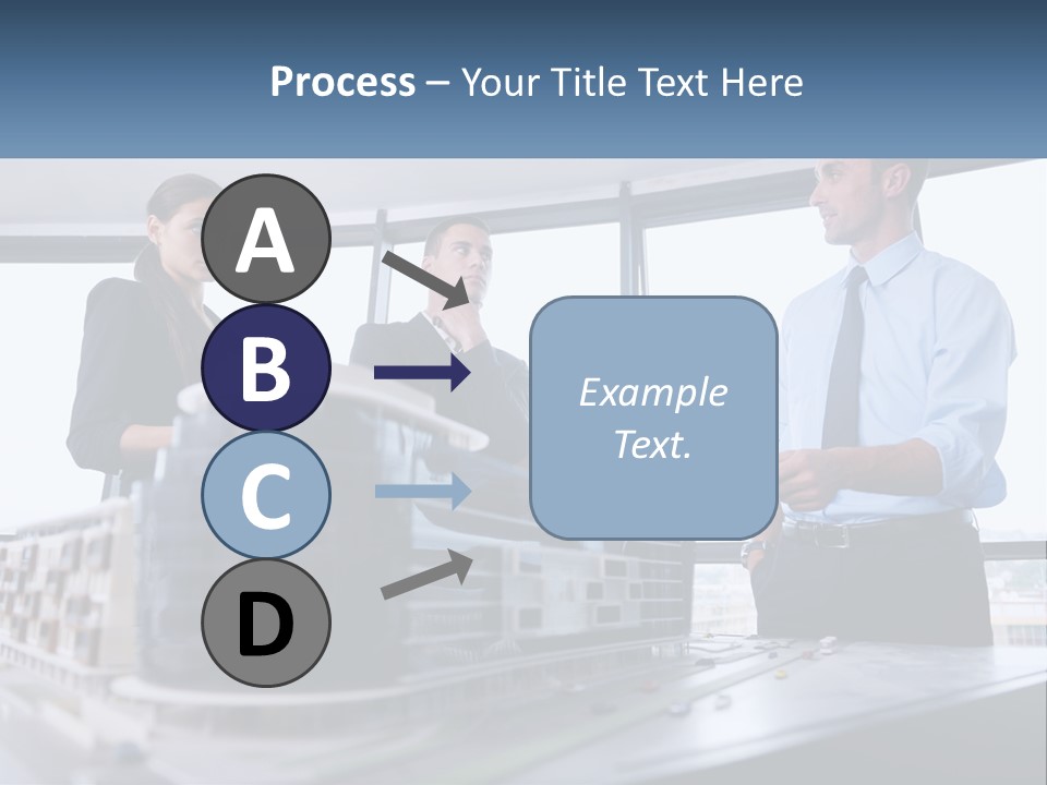 A Group Of People Standing Around A Model Of A Building PowerPoint Template